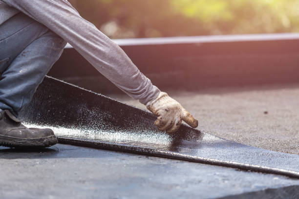 Professional Waterproofing technician working in New Haven, NY